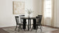 Strouse 47-inch Round Wood Dining Room Table Black